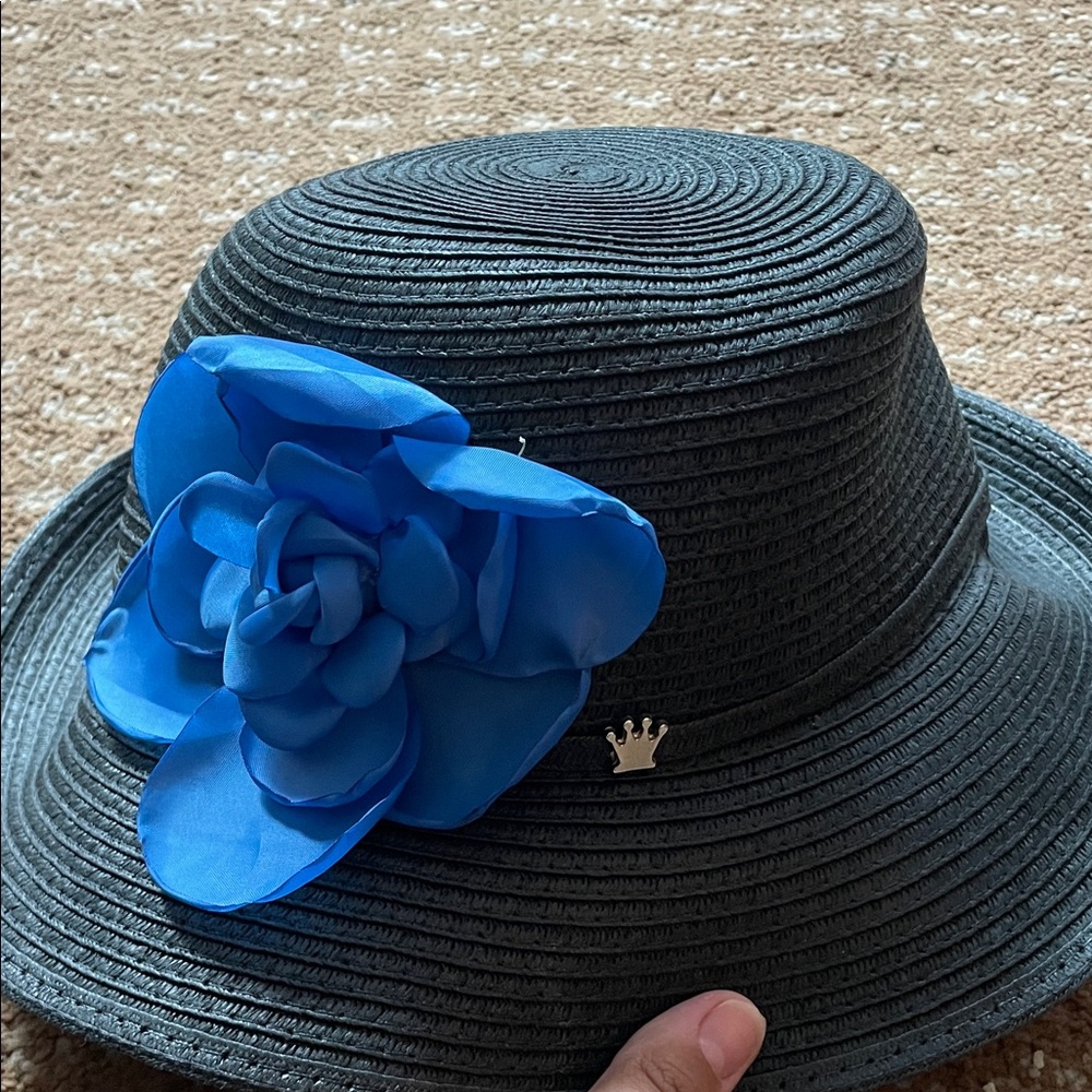 Chic Black Hat with Blue Floral Detail